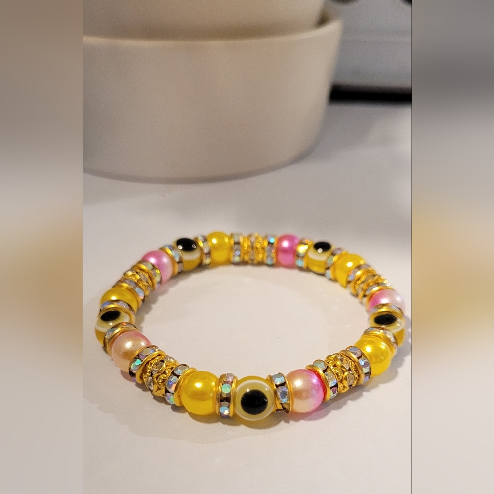 Yellow and pink Evil Eye beaded protection Mal De Ojo Kabbalah Fashion Bracelet